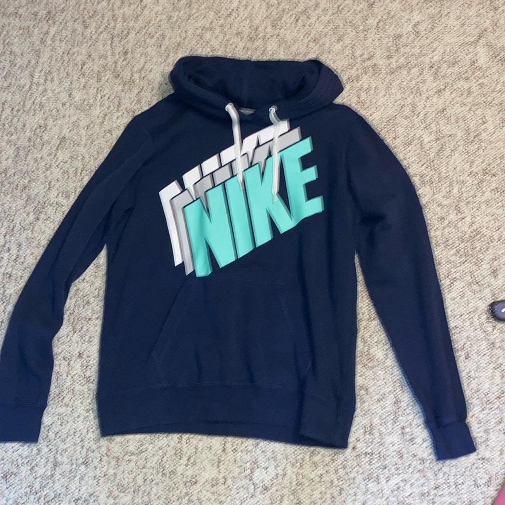 LIKE NEW….Navy Blue Nike Sweatshirt with white/ gray/ teal Nike Logo on front